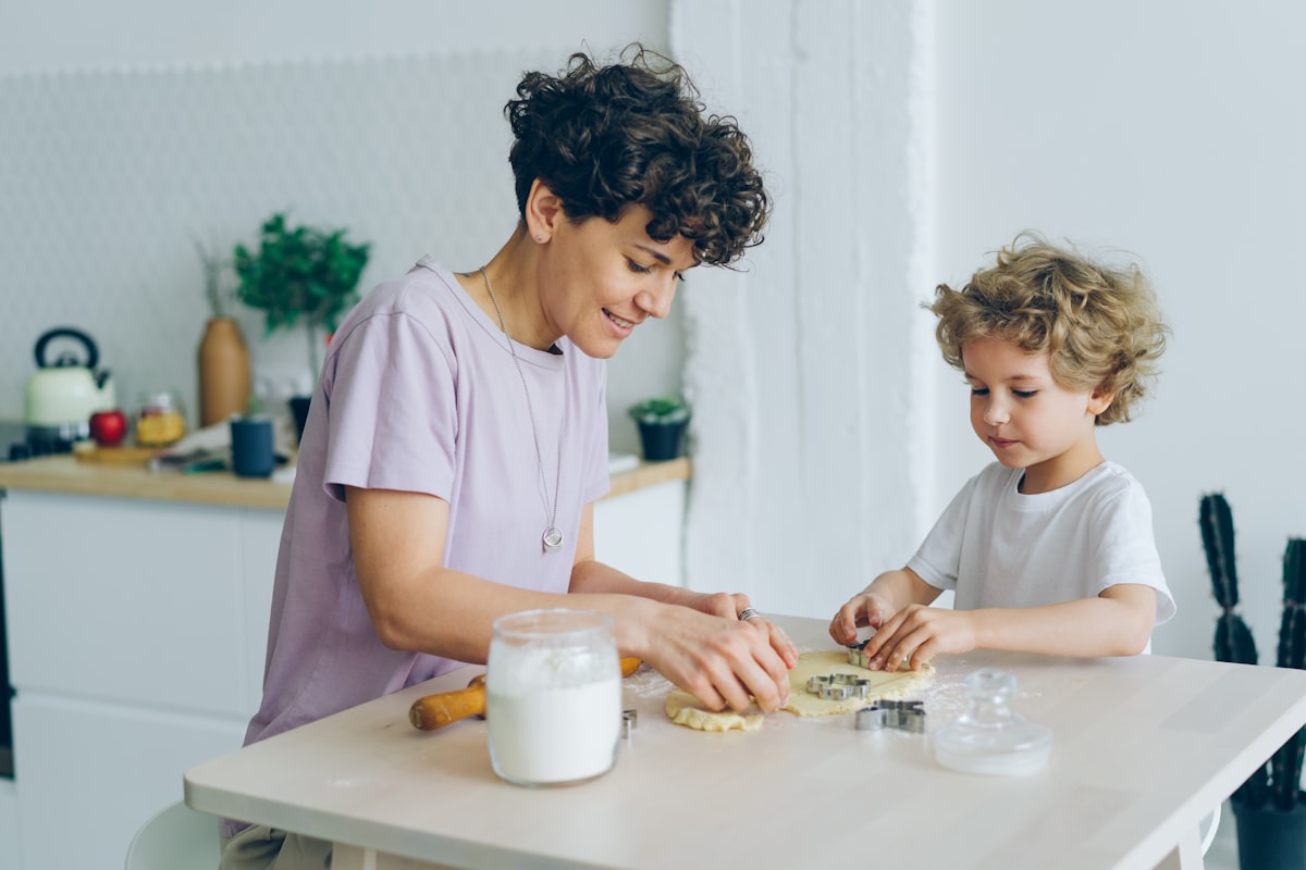 Family cooking together in kitchen